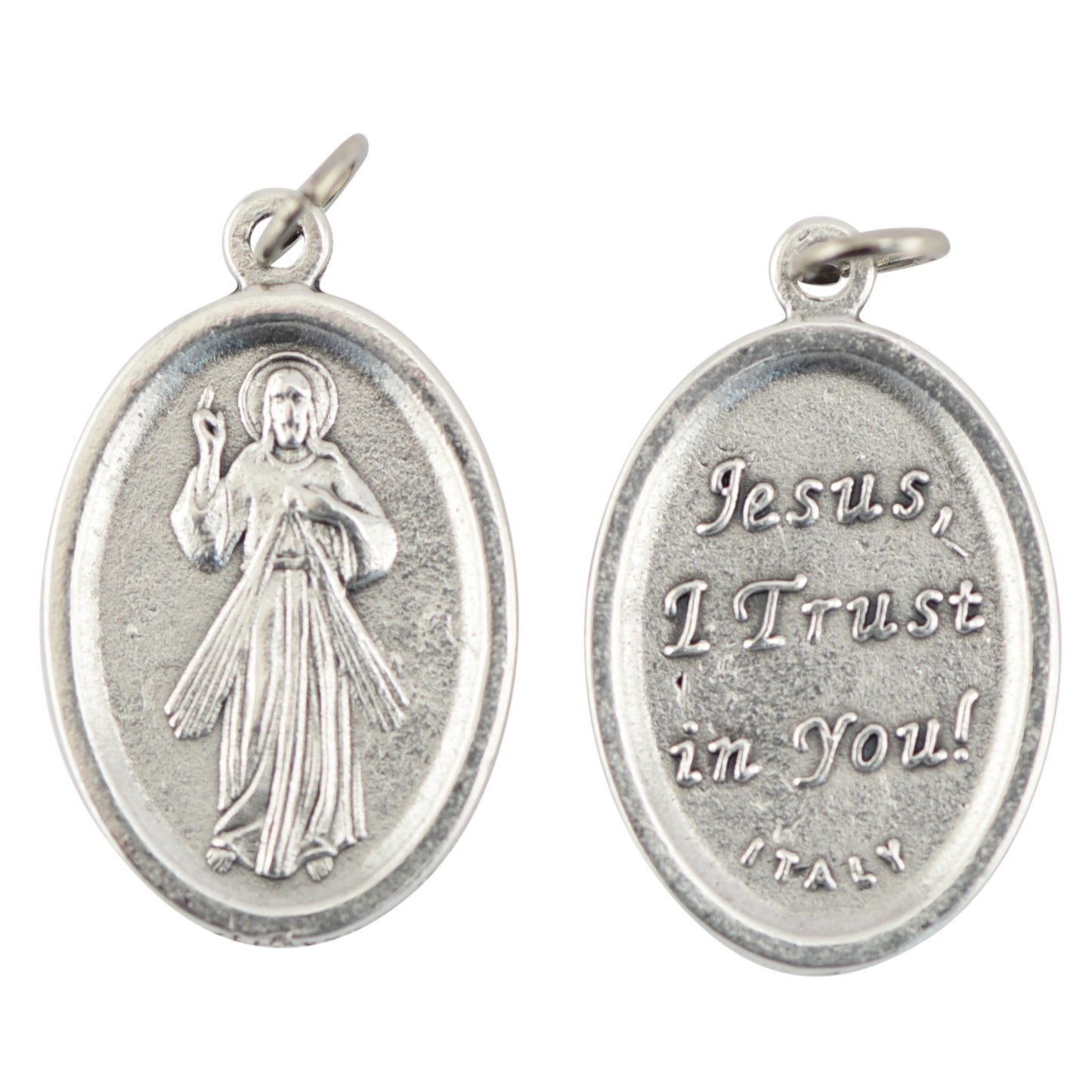 Silver religious pendant with 'Jesus, I Trust in You!' inscription on a white background