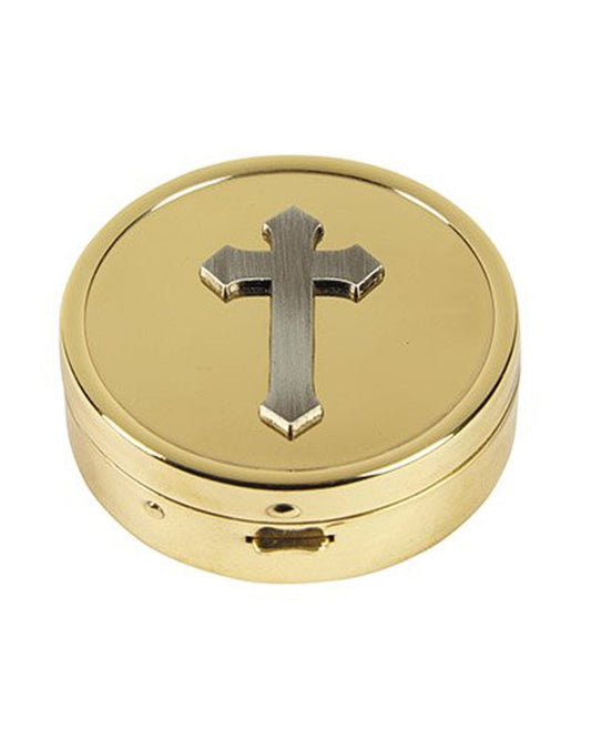 Gold round box with a silver cross on a white background