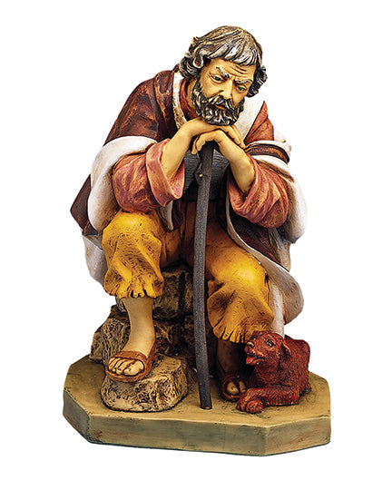 Statue of a bearded man with a dog on a white background