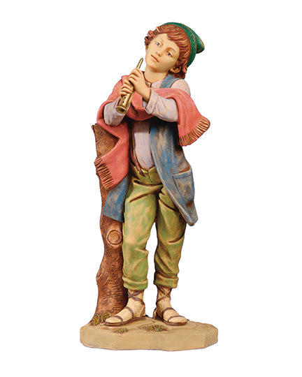 Statue of a boy playing a flute on a white background