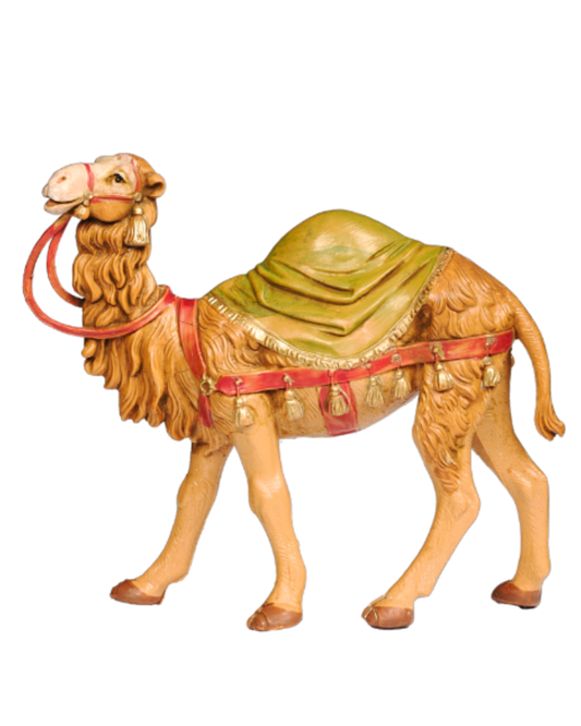 Camel figurine with a green saddle on a white background