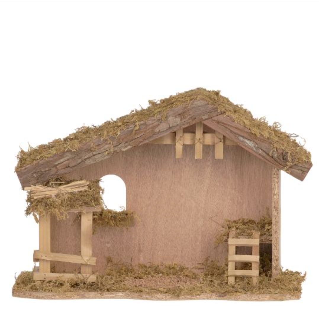 Model of a rustic wooden cabin with thatched roof on a white background