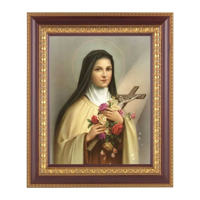 Framed artwork of a religious figure holding flowers and a cross.