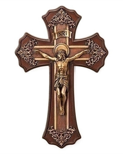 Wooden cross with Jesus Christ figure on a white background