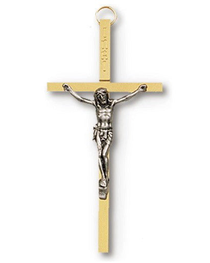 Gold crucifix with silver Jesus figure on a white background