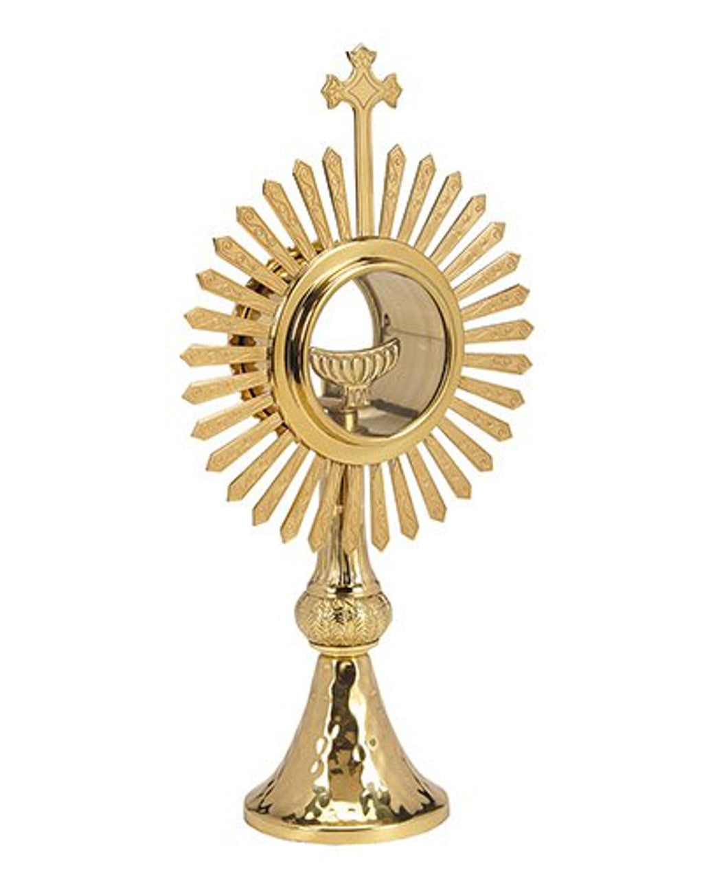 Gold monstrance with sunburst design on a white background