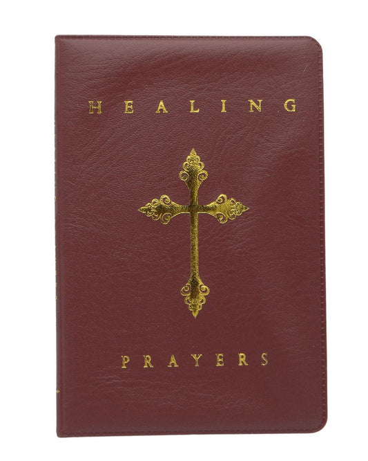 Brown prayer book with gold cross and text on a white background