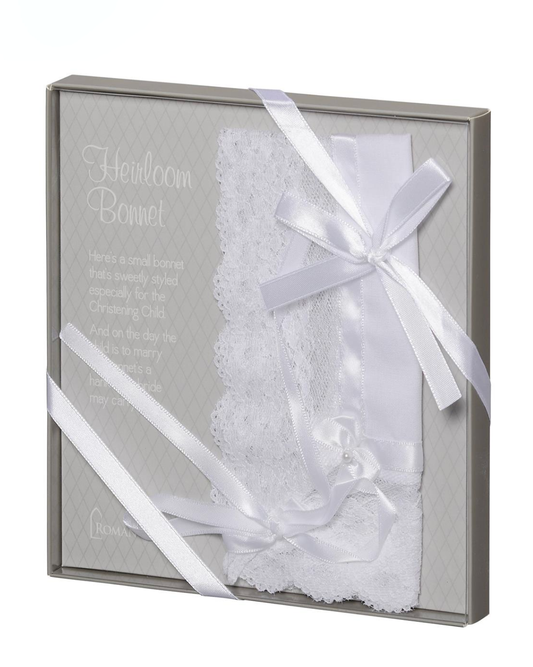 White lace baby bonnet in a gray box with a white ribbon