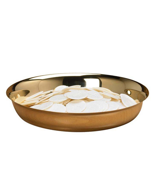 Gold tray with white stones on a white background