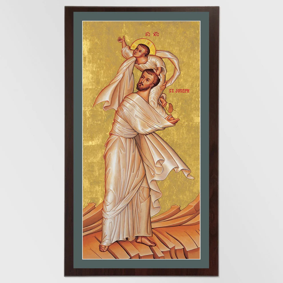 Framed artwork of a religious figure with a gold background