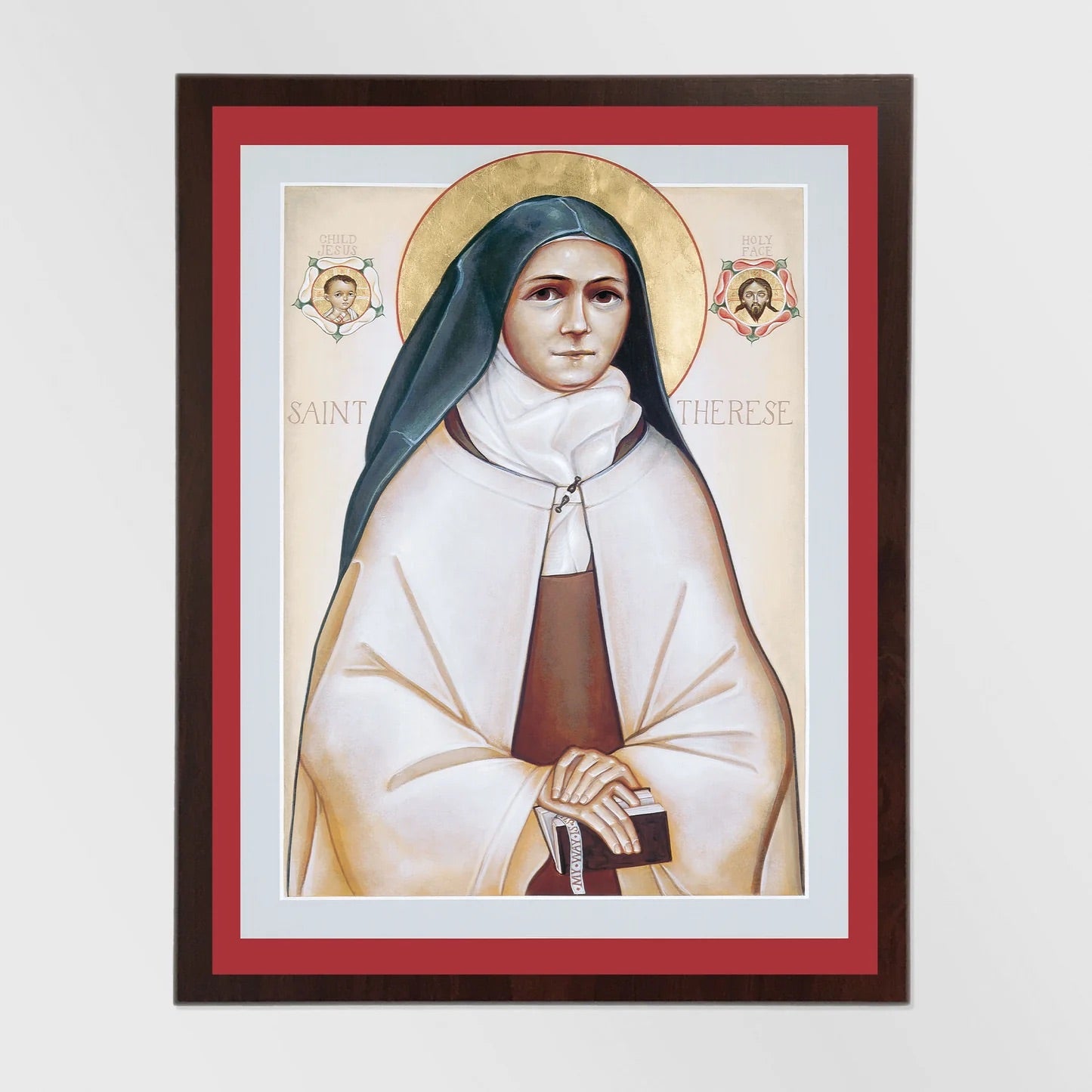 Framed artwork of a religious figure with a red border on a white background