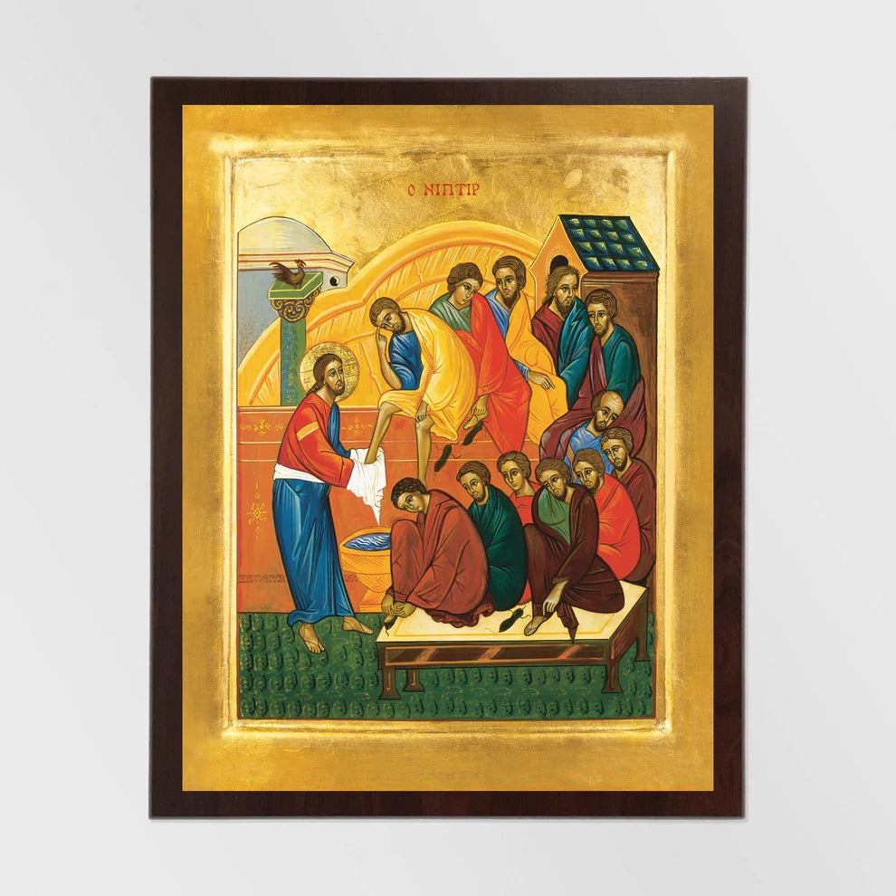 Framed religious artwork with gold background and colorful figures on a white background