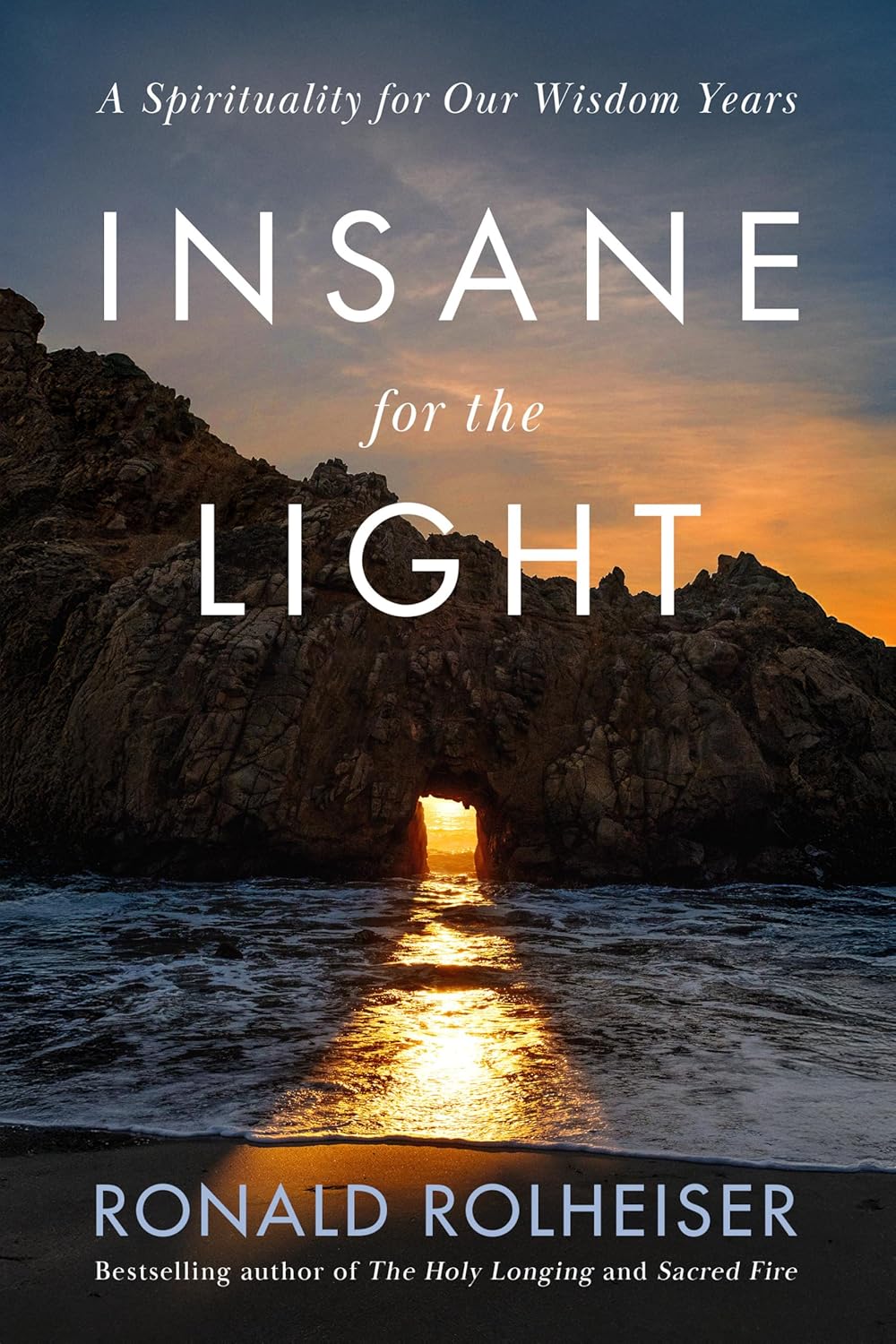 Book cover of 'Insane for the Light' with a sunset over a cave entrance.