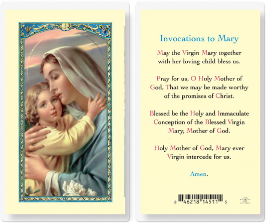 Prayer card with image of Virgin Mary holding child and text on a yellow background