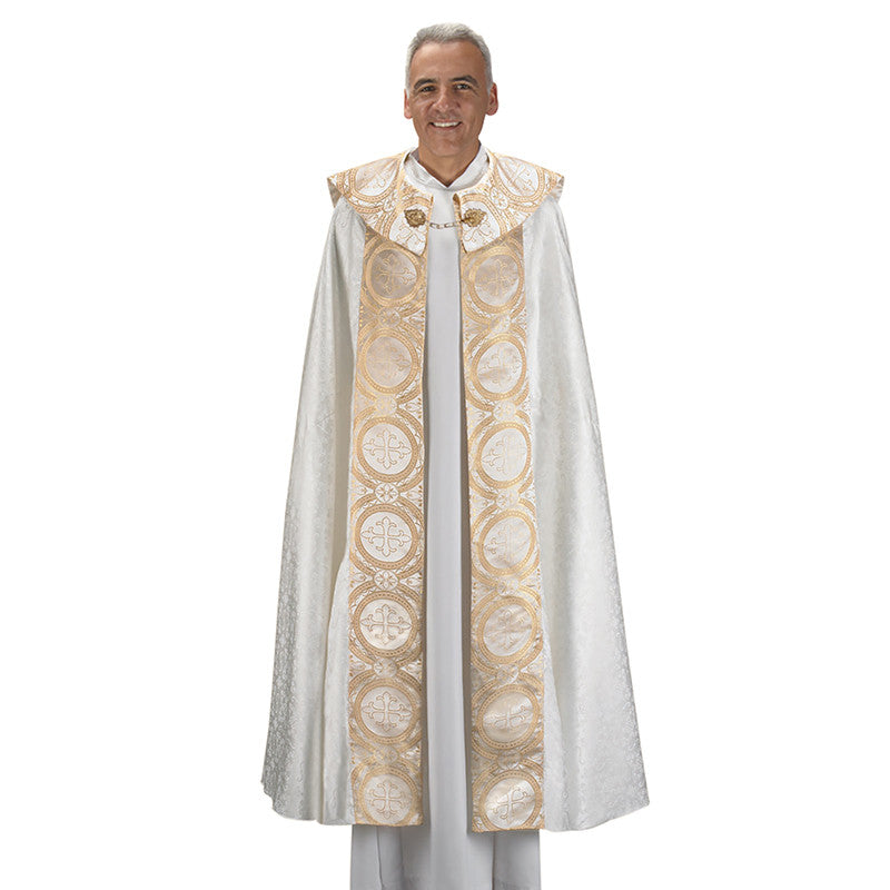 Man wearing a white and gold liturgical vestment on a white background