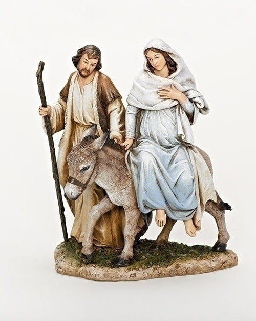 Statue of a man and woman with a donkey on a white background