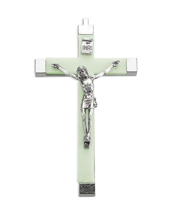 Cross with Jesus Christ figure on a light green background