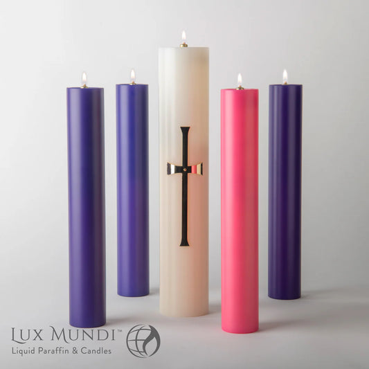 Set of five candles with a central beige candle featuring a cross design, on a light gray background. Brand 'Lux Mundi' visible.