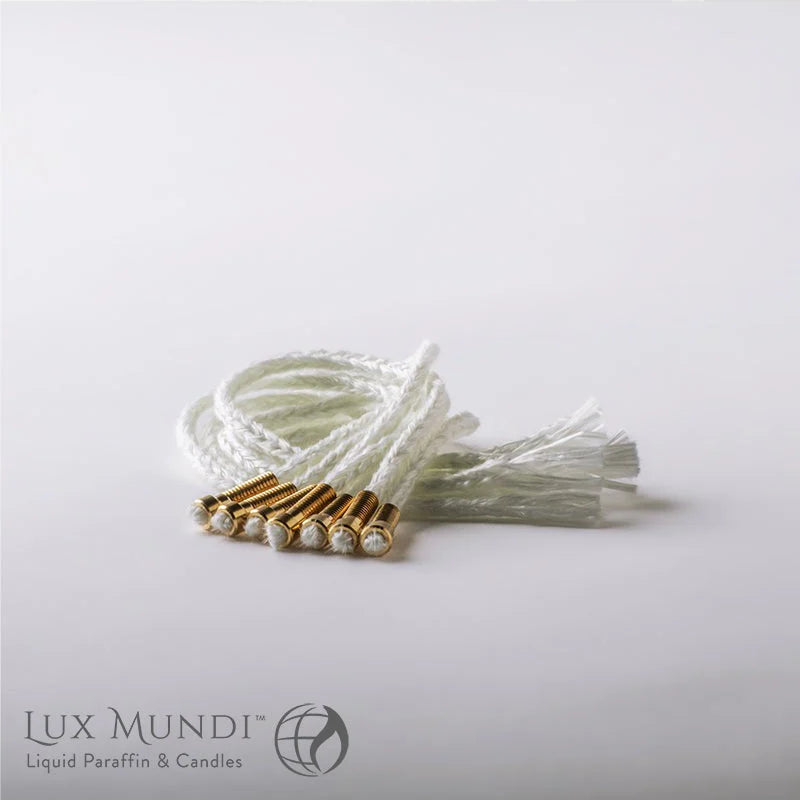 Lux Mundi candles on a white background