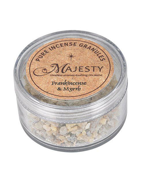 Jar of pure incense granules labeled 'Majesty' with frankincense and myrrh on a white background