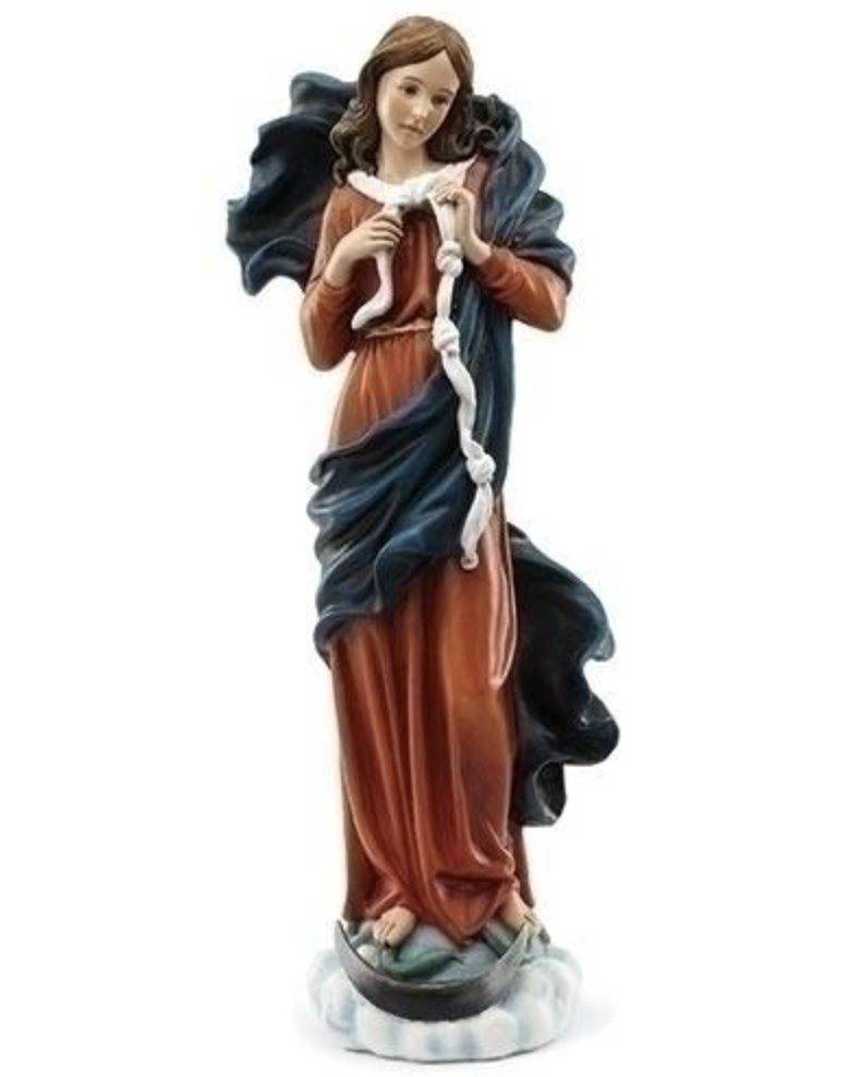 Statue of a woman holding a snake on a white background