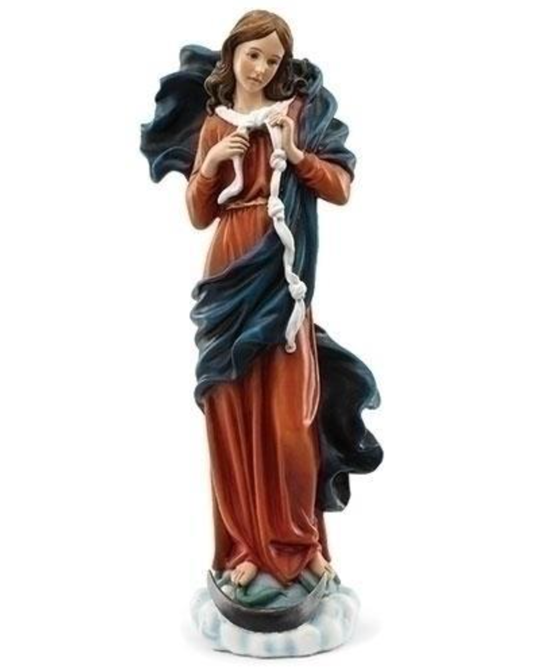 Statue of a woman holding a snake on a white background