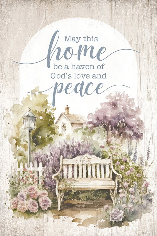 A wooden home plaque with a garden scene and a religious message stating 'May this home be a haven of God's love and peace'.