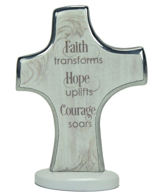 Decorative cross with engraved text on a white background