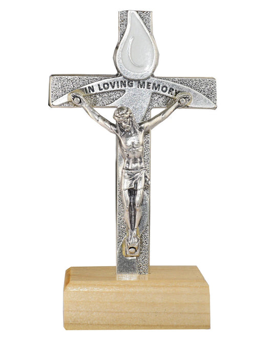 Crucifix with 'In Loving Memory' on a white background