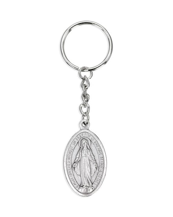 Silver keychain with a religious pendant on a white background