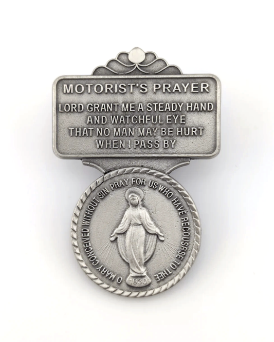 Motorist's prayer badge with religious design on a white background
