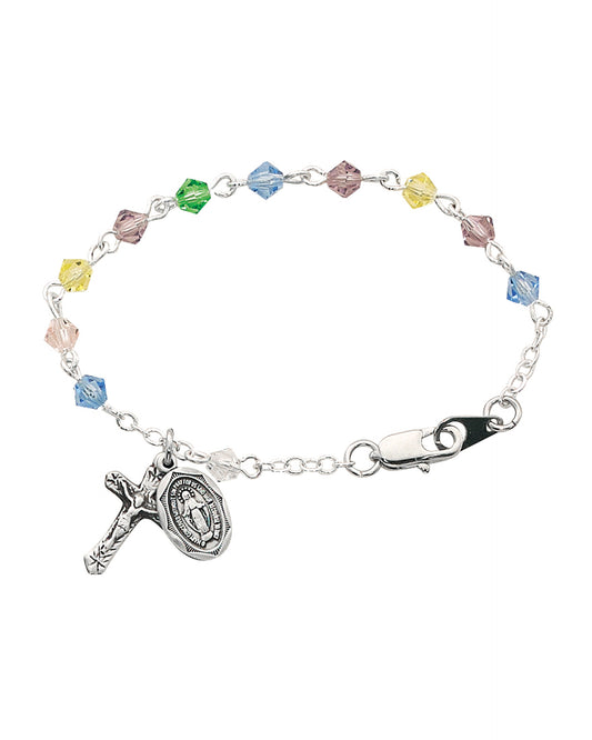 Bracelet with colorful beads and religious charms on a white background