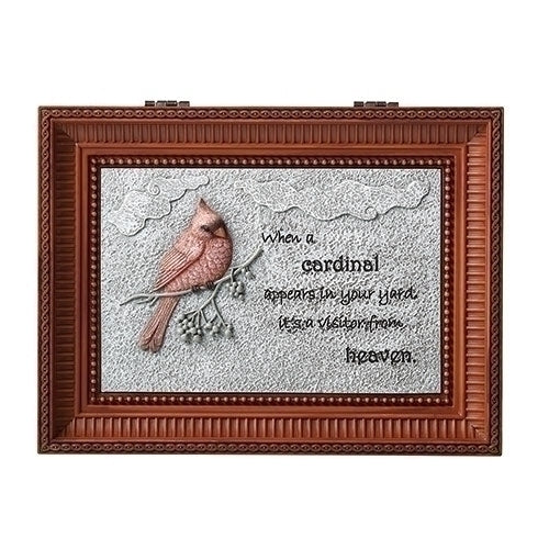 A music box with a wood-like frame featuring an image of a cardinal bird perched on a branch, with a message and the piece 'Nocturne' played by the music box.