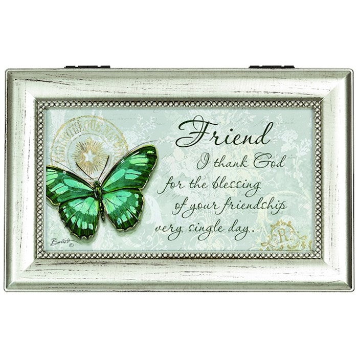 Decorative plaque with a green butterfly and text on a light background