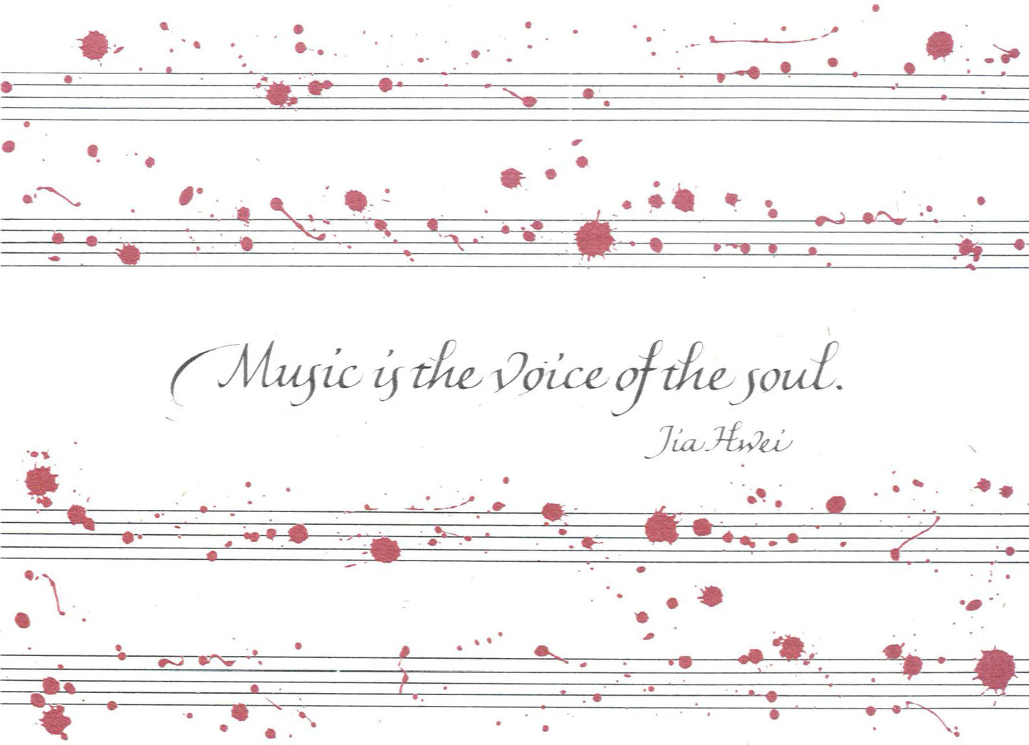 Sheet music with red splashes and a quote about music on a white background
