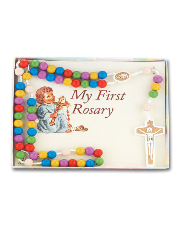 Box of 'My First Rosary' with colorful beads and religious illustrations on a white background