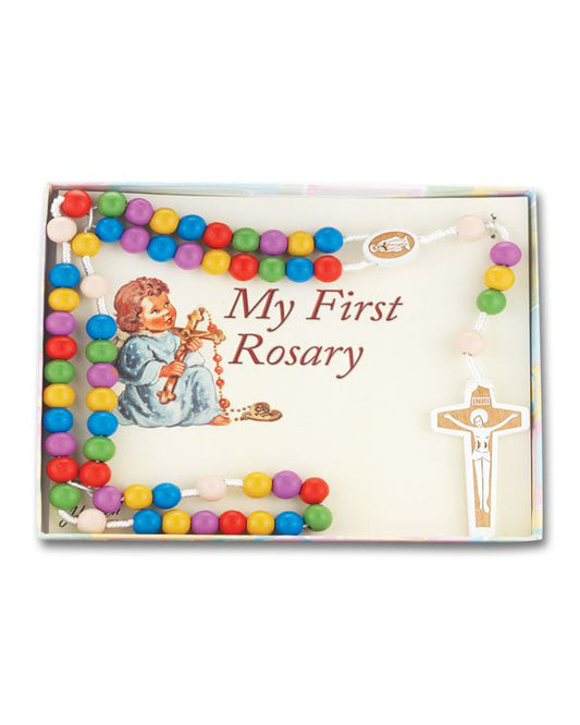 Box of 'My First Rosary' with colorful beads and religious illustrations on a white background