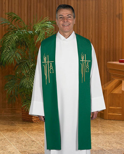 Priest wearing a green stole with symbols in a church setting