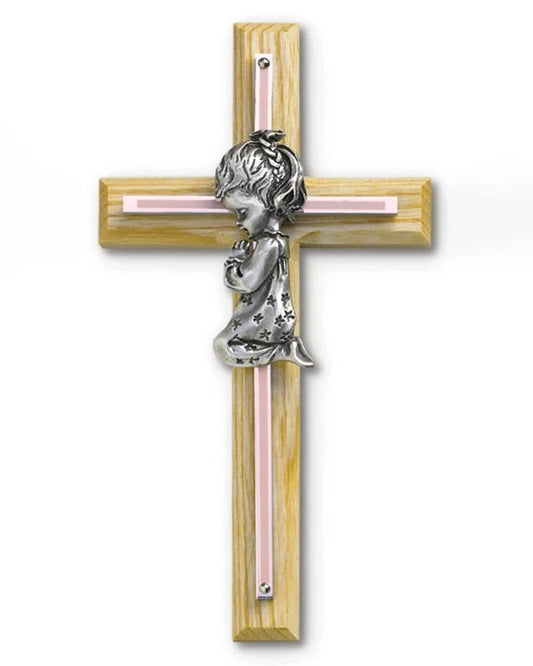 Wooden cross with a cherub figure on a white background
