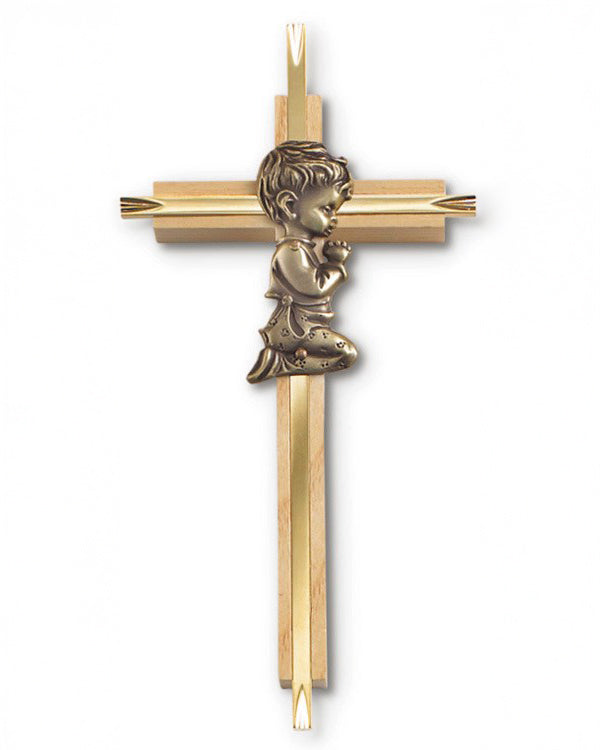 Gold cross with an angel figure on a white background