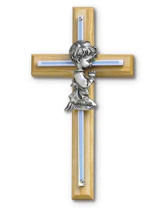 Wooden cross with silver angel figure on a white background