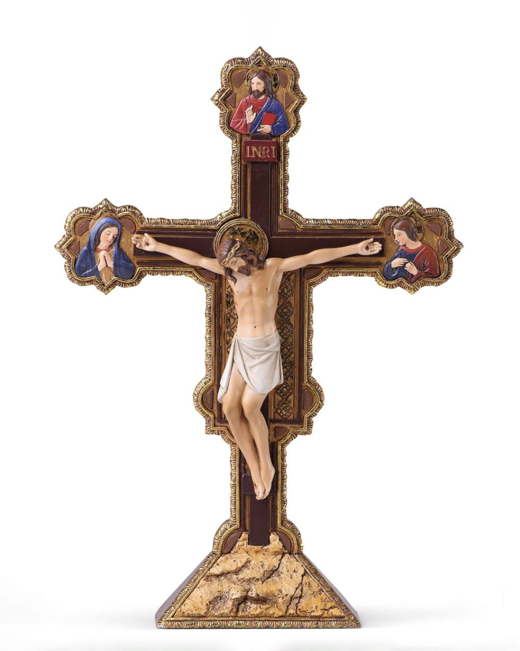 Decorative crucifix with religious figures on a white background