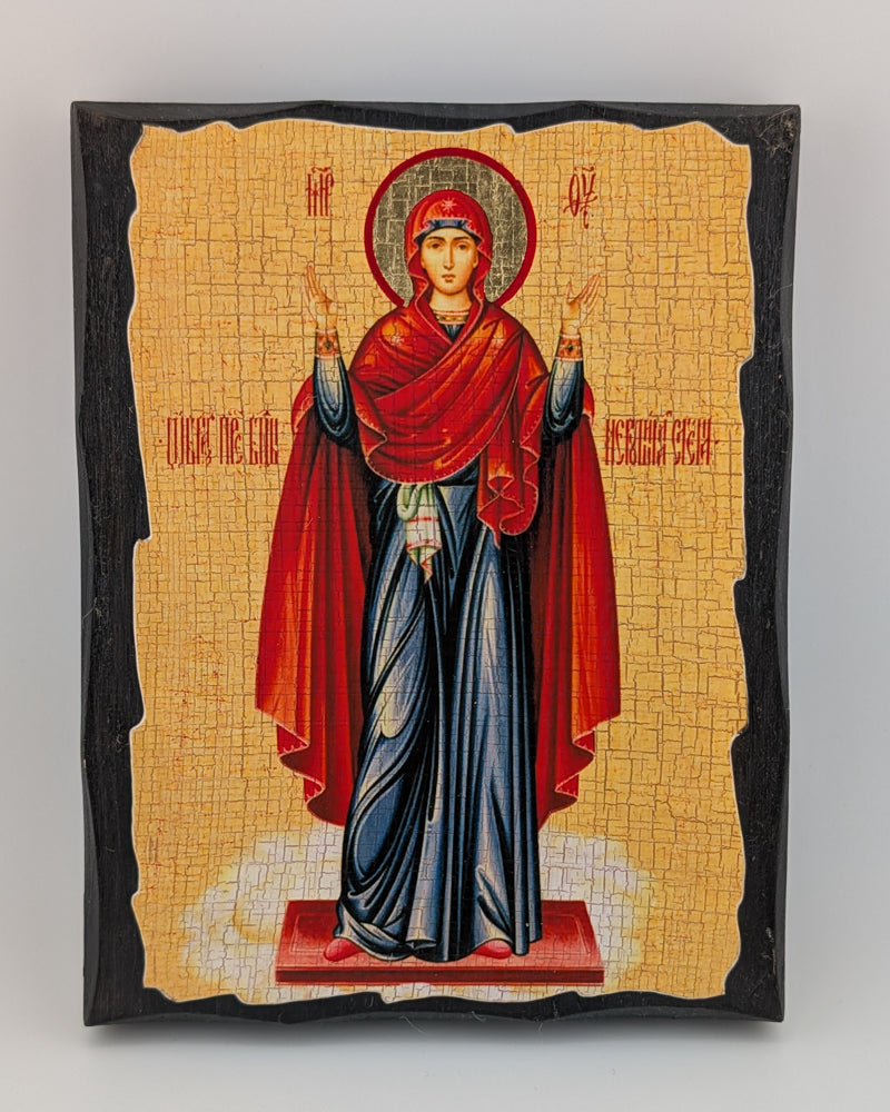 Decorative icon with a central figure in red and blue robes on a beige background