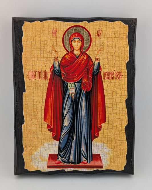 Decorative icon with a central figure in red and blue robes on a beige background