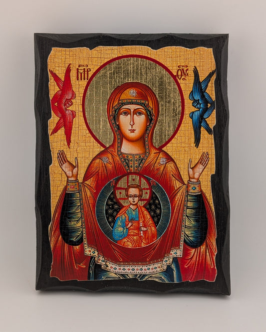 Decorative icon with religious design on a beige background