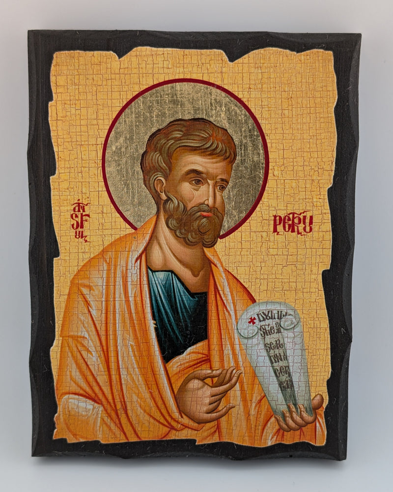 Icon of a religious figure holding a scroll on a beige background
