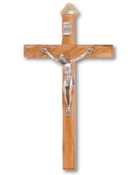 Wooden crucifix with silver Jesus figure on a white background