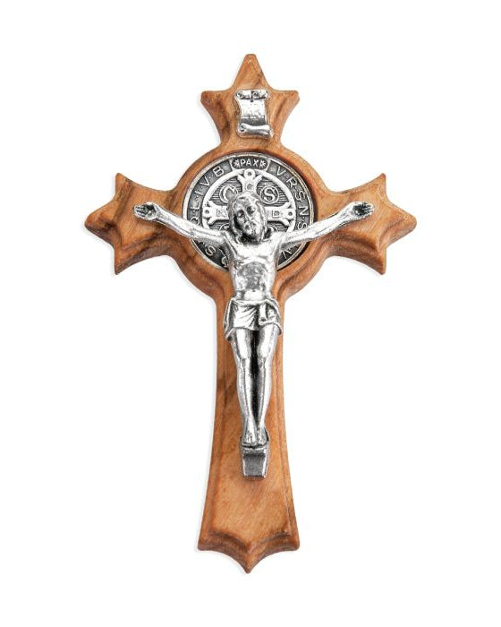 Wooden cross with silver crucifix on a white background