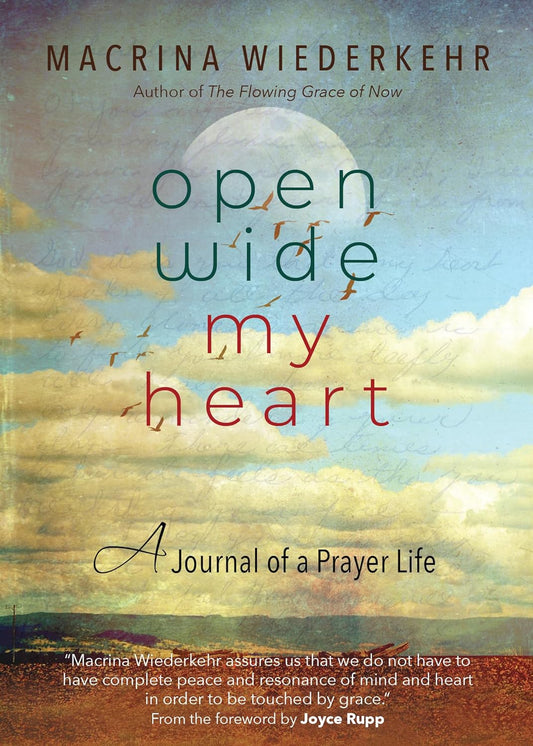 Book cover of 'Open Wide My Heart' by Macrina Wiederkehr with a scenic background.