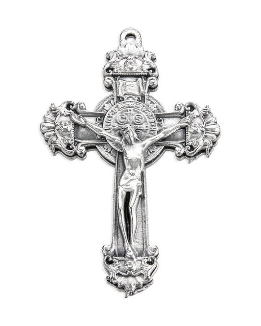 Silver crucifix pendant on a white background